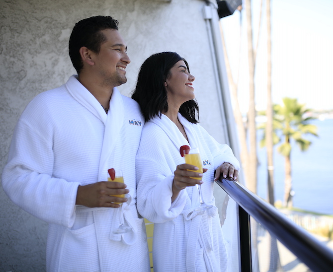 Couple Enjoys view from Balcony