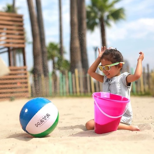 girl playing on the beach